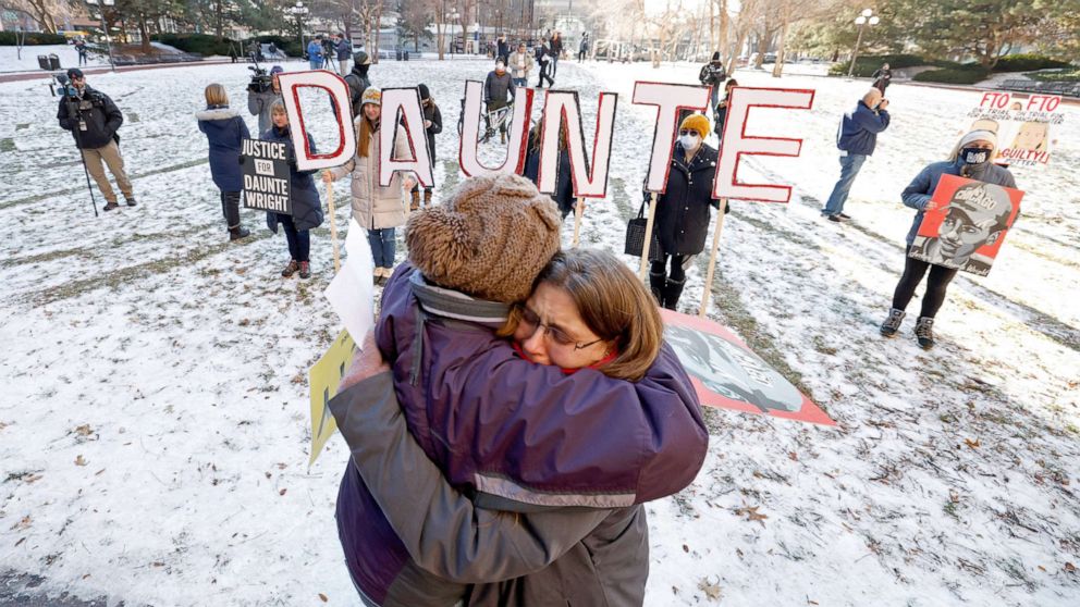 PHOTO: People react to the outcome in the manslaughter trial of Kimberly Potter, outside the Hennepin County Courthouse in Minneapolis, Minn., Dec. 23, 2021. Potter was found guilty in the fatal shooting of Daunte Wright.
