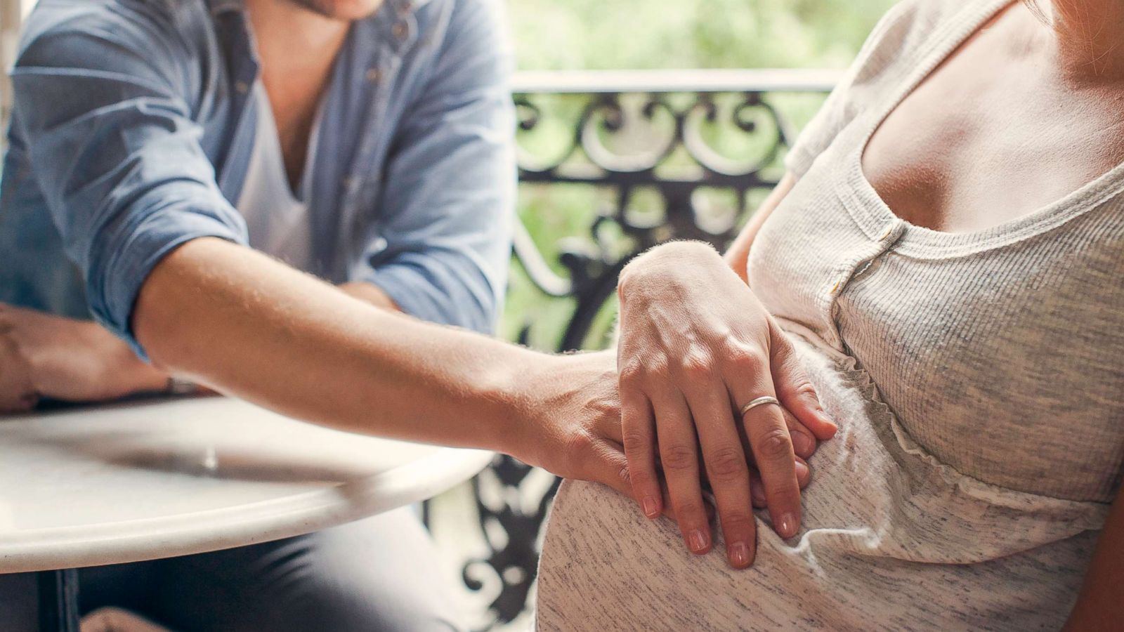 PHOTO: A pregnant woman and man touch her belly in this stock image.