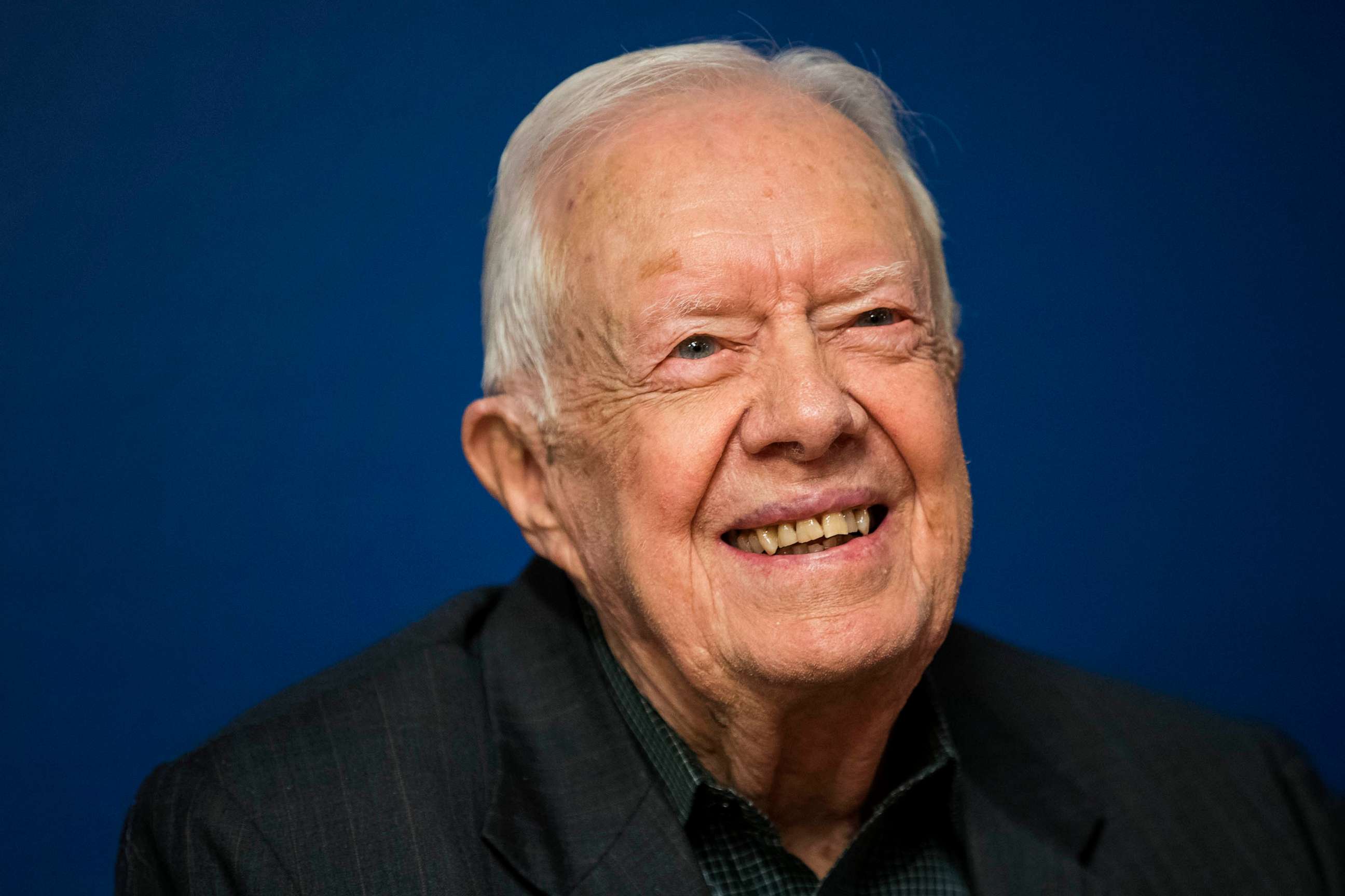 PHOTO: FILE - Former U.S. President Jimmy Carter smiles during a book signing event in Midtown Manhattan, March 26, 2018 in New York City.