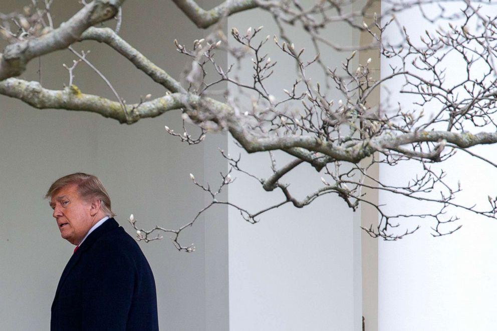 PHOTO: President Donald Trump walks to the Oval Office while arriving back at the White House, Dec. 31, 2020, in Washington, DC.