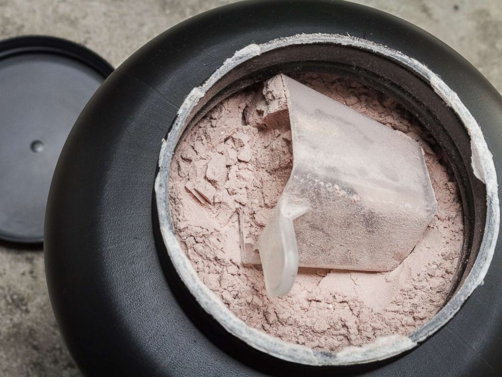 PHOTO: A scoop of fine whey protein powder sits in a container in an undated stock photo.
