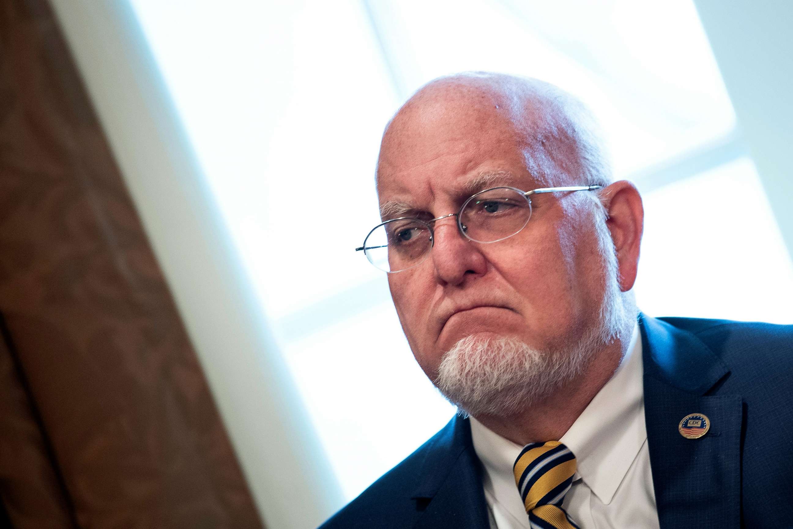 PHOTO: Centers for Disease Control and Prevention Director Robert Redfield sits after a meeting with nursing industry representatives in the Roosevelt Room of the White House about the COVID-19 pandemic, March 18, 2020, in Washington.