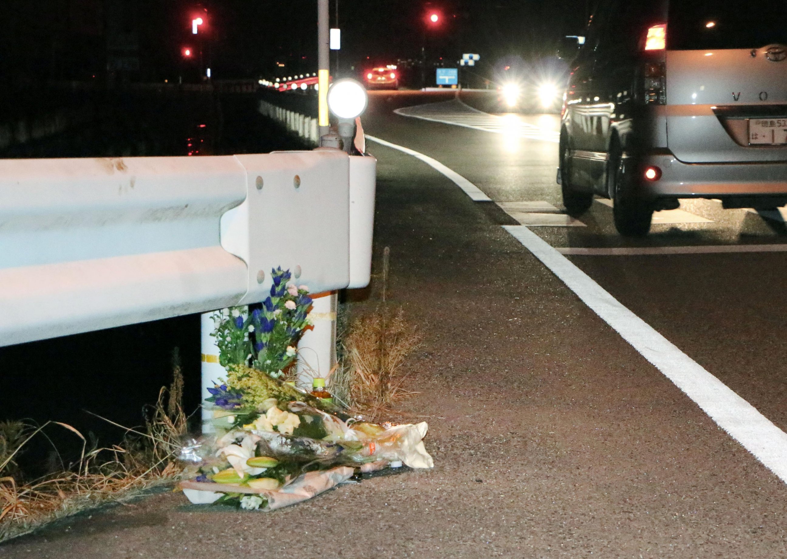 PHOTO: Flowers are laid near the scene where a pedestrian was killed after being hit by a driver playing "Pokemon Go" while driving in Tokushima, Japan, Aug. 24, 2016.