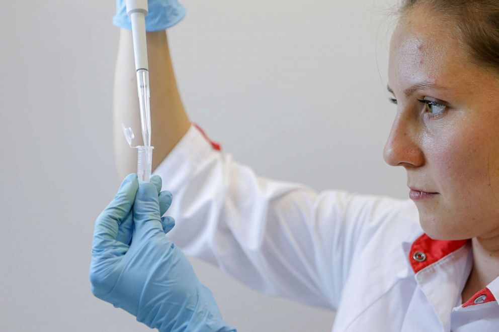 PHOTO: A scientist works inside a laboratory of the Gamaleya Research Institute of Epidemiology and Microbiology during the production and laboratory testing of a vaccine against the coronavirus disease (COVID-19), in Moscow, Aug. 6, 2020.