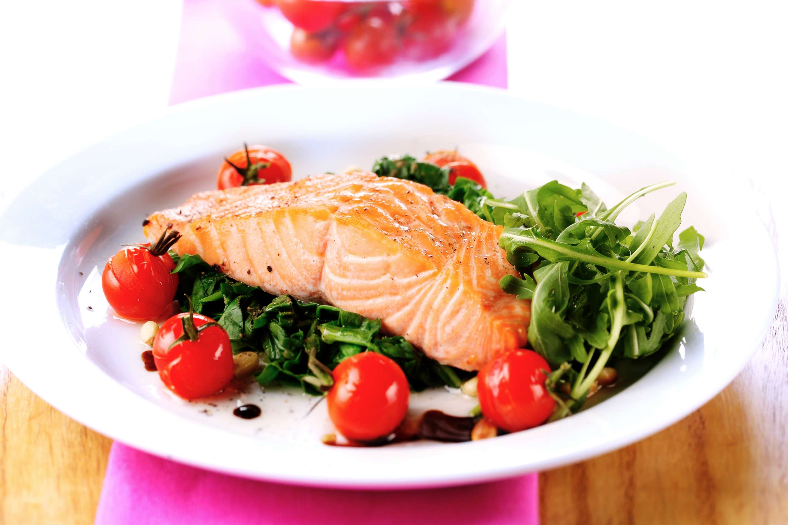 PHOTO: Salmon is served on a bed of spinach in this undated stock photo.