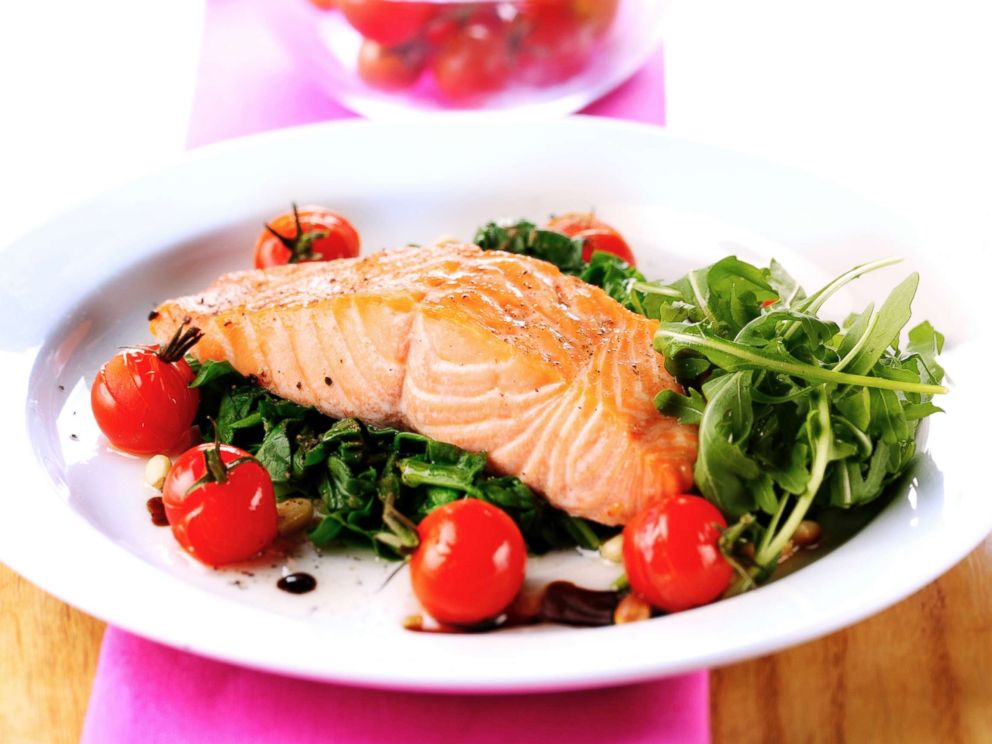 PHOTO: Salmon is served on a bed of spinach in this undated stock photo.