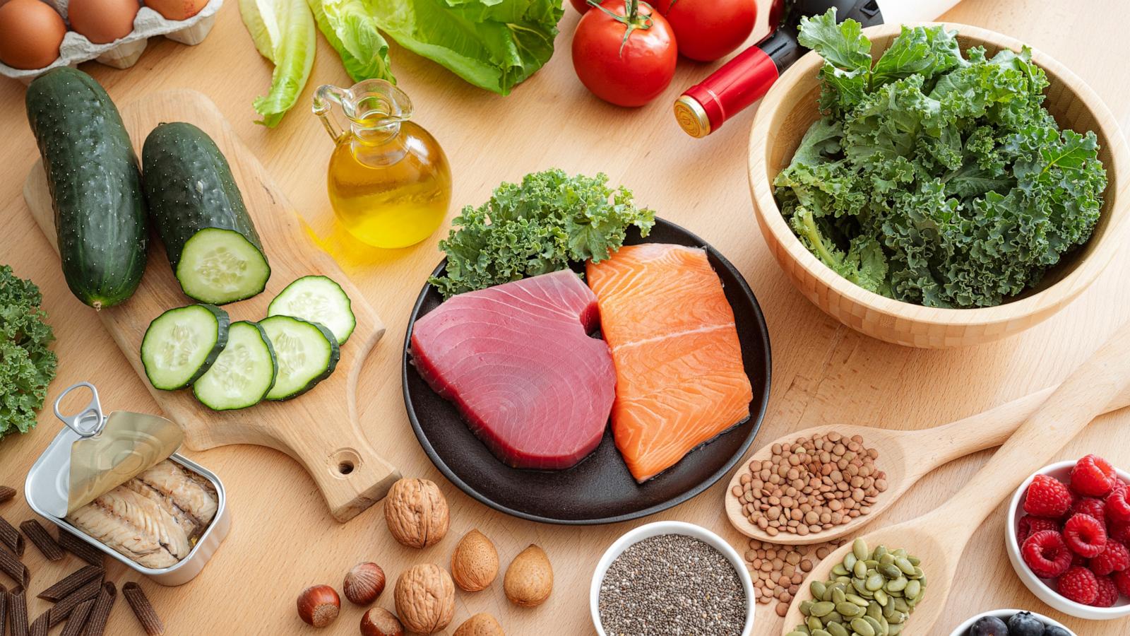 PHOTO: MIND diet ingredients on the kitchen table. Food rich in antioxidants to reduce dementia and brain failure risks. Brain-healthy dieting plan. Combination of Mediterranean and DASH diet.