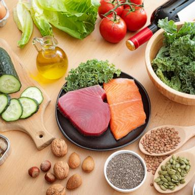 PHOTO: MIND diet ingredients on the kitchen table. Food rich in antioxidants to reduce dementia and brain failure risks. Brain-healthy dieting plan. Combination of Mediterranean and DASH diet.