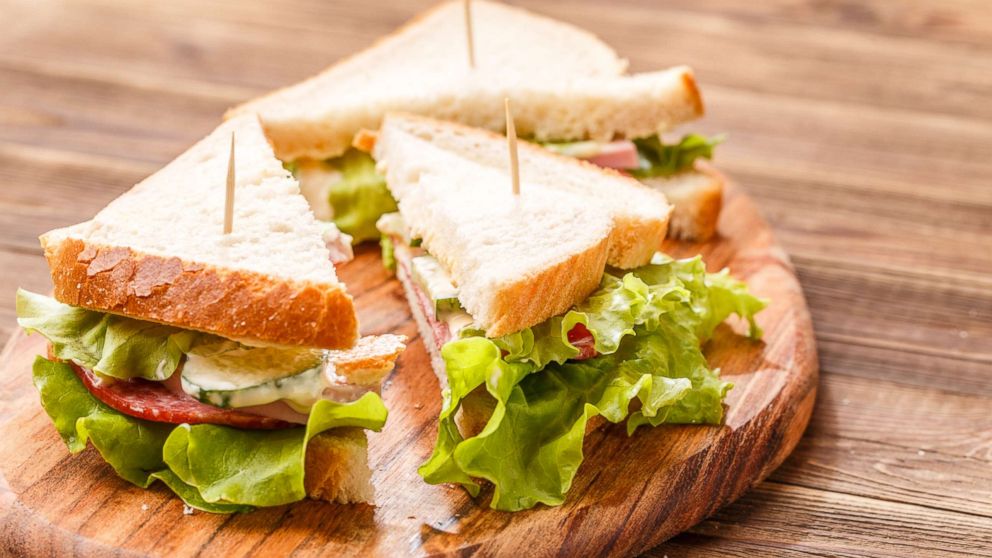 PHOTO: Sandwich triangles held together with toothpicks sit on a cutting board in an undated stock photo.