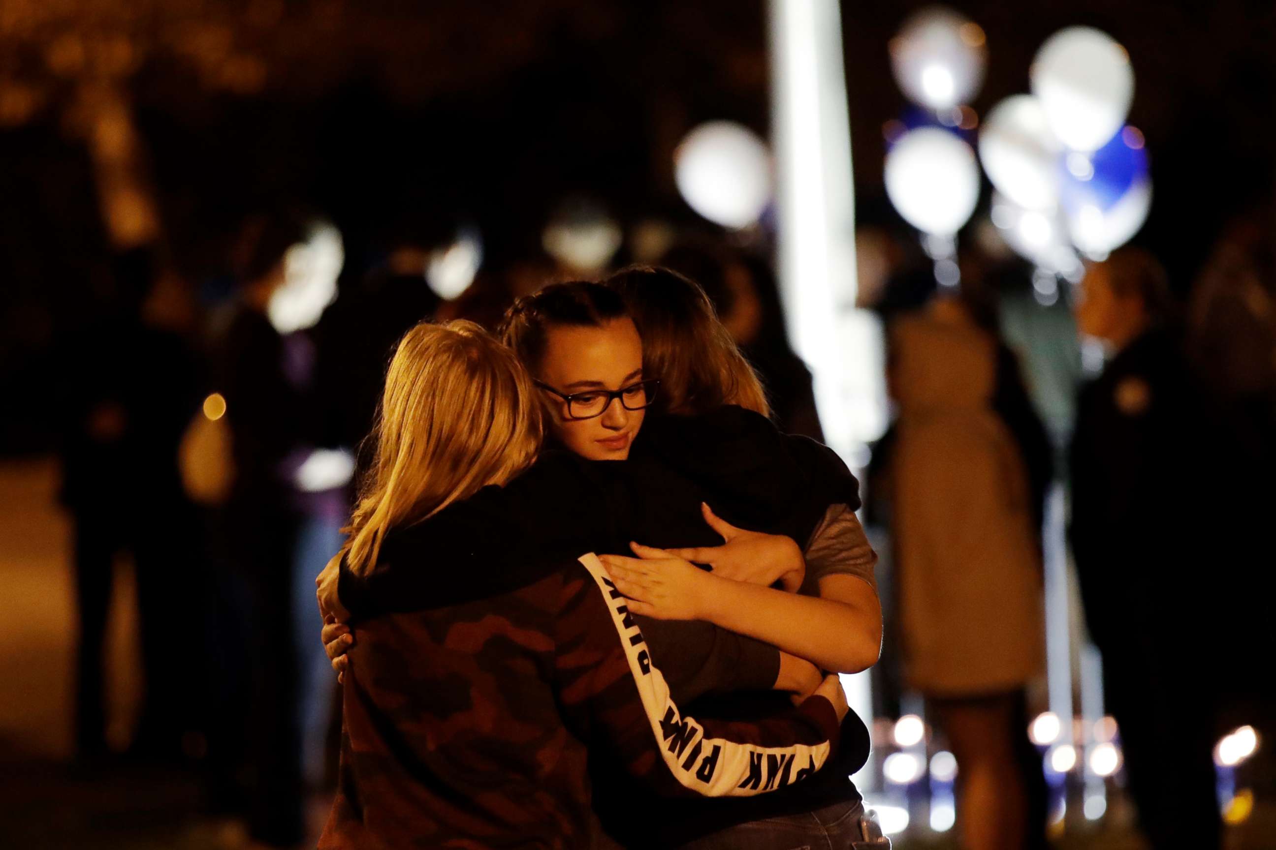 PHOTO: Students embrace during a vigil at Central Park in the aftermath of a shooting at Saugus High School in Santa Clarita, Calif., Nov. 14, 2019.