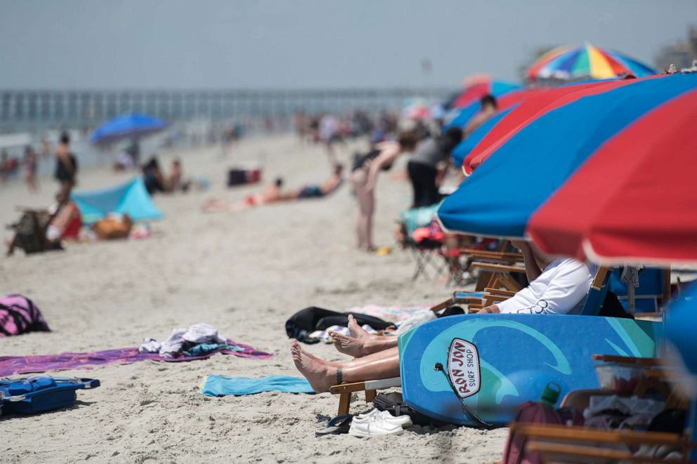 PHOTO: People enjoy the beach on July 4, 2020 in Myrtle Beach, S.C.