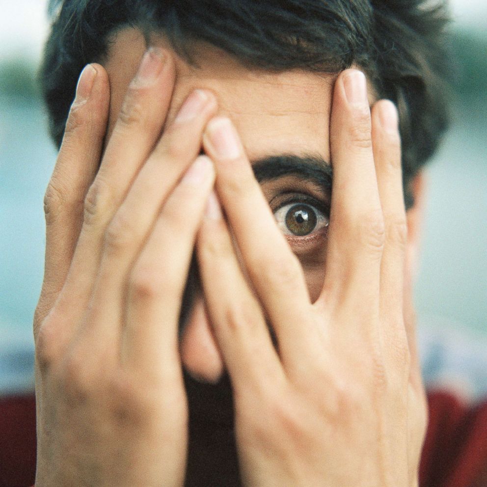 PHOTO: A man covers his face in an undated stock photo. 