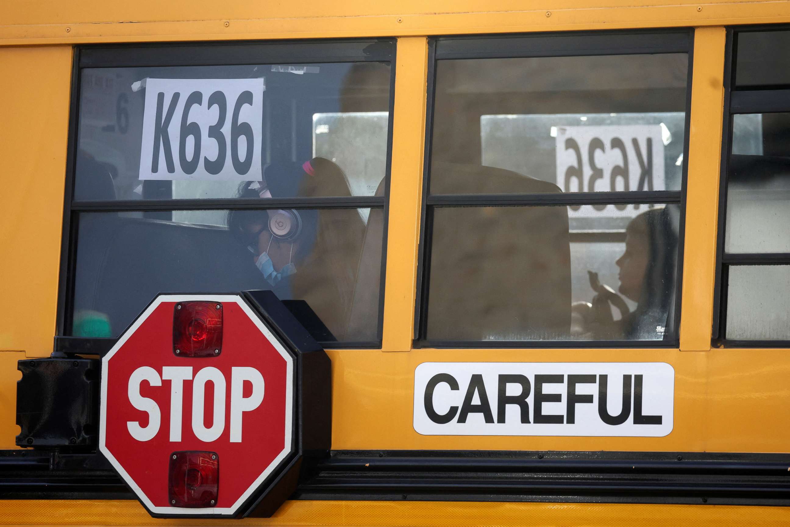 PHOTO: Children ride a school bus on the first day of New York City Public Schools in the Brooklyn borough of New York, Sept. 8, 2022.