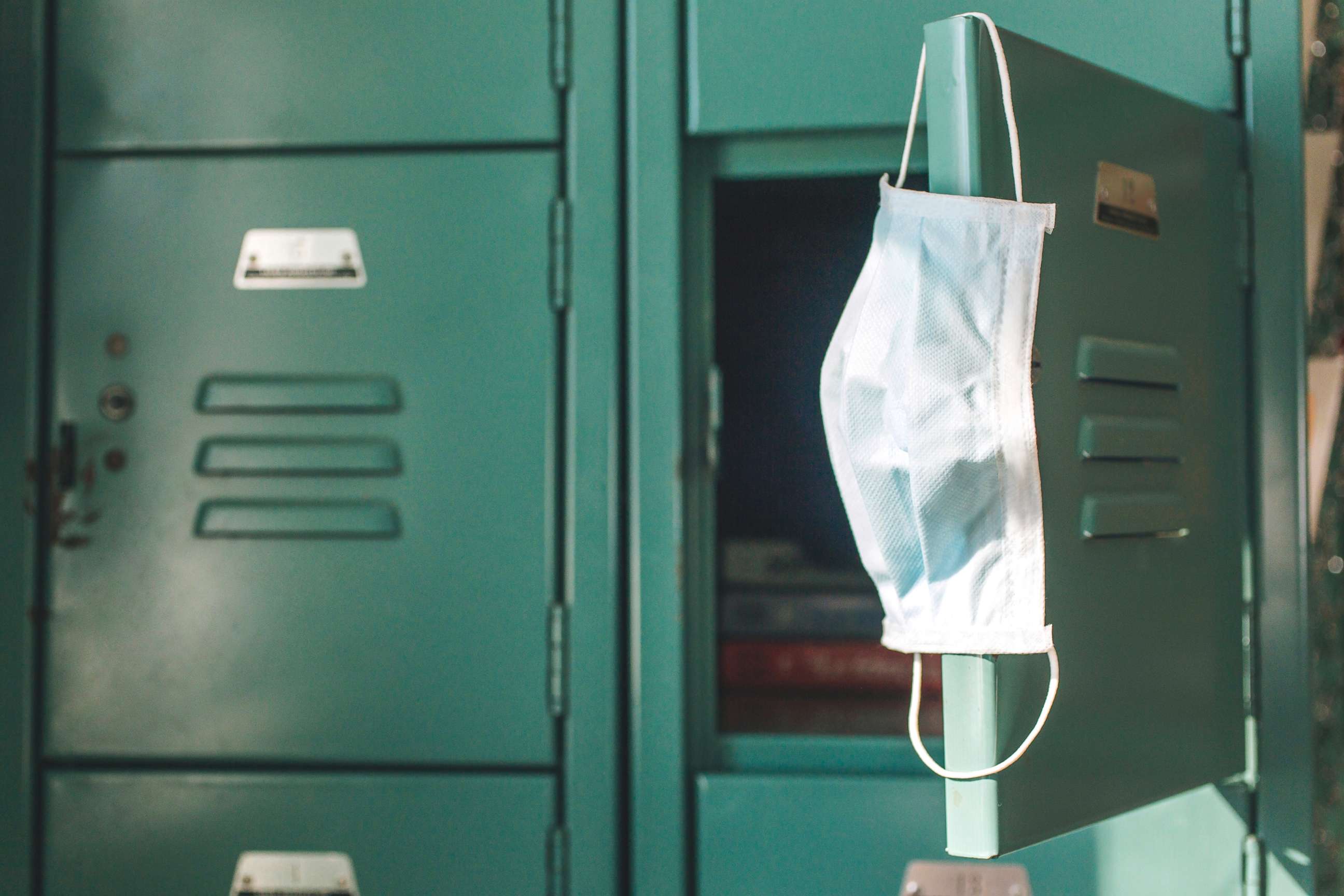 PHOTO: A masks hangs inside school on locker in this undated stock photo.
