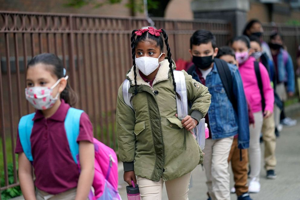 PHOTO: Students line up to enter Christa McAuliffe School in Jersey City, N.J., April 29, 2021.
