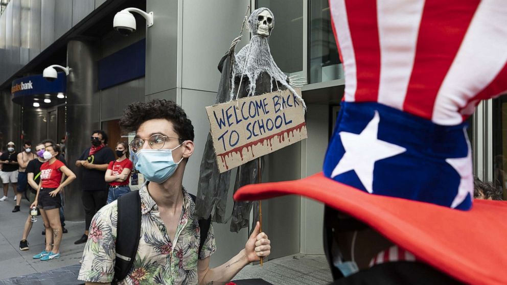 PHOTO: Protesters gather to oppose plans to reopen schools in the midst of the coronavirus pandemic in New York, Aug. 2020. 