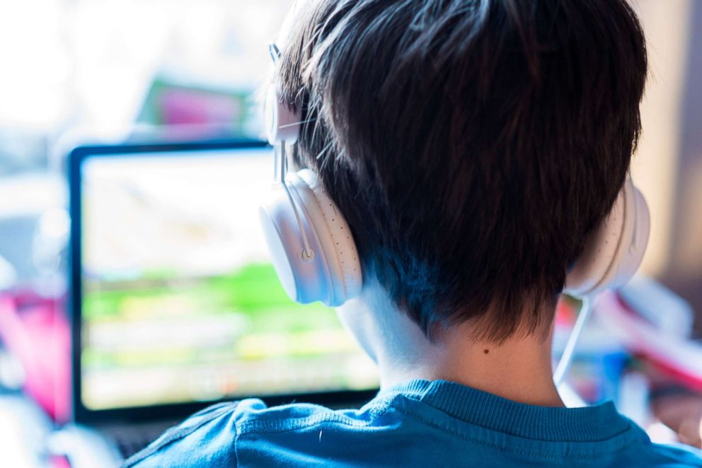 PHOTO: A child plays on a laptop in this stock photo.