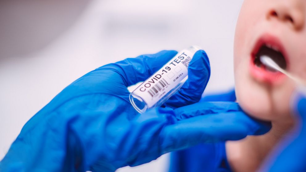 PHOTO: A doctor administers a COVID-19 test to a child on June 11, 2020.