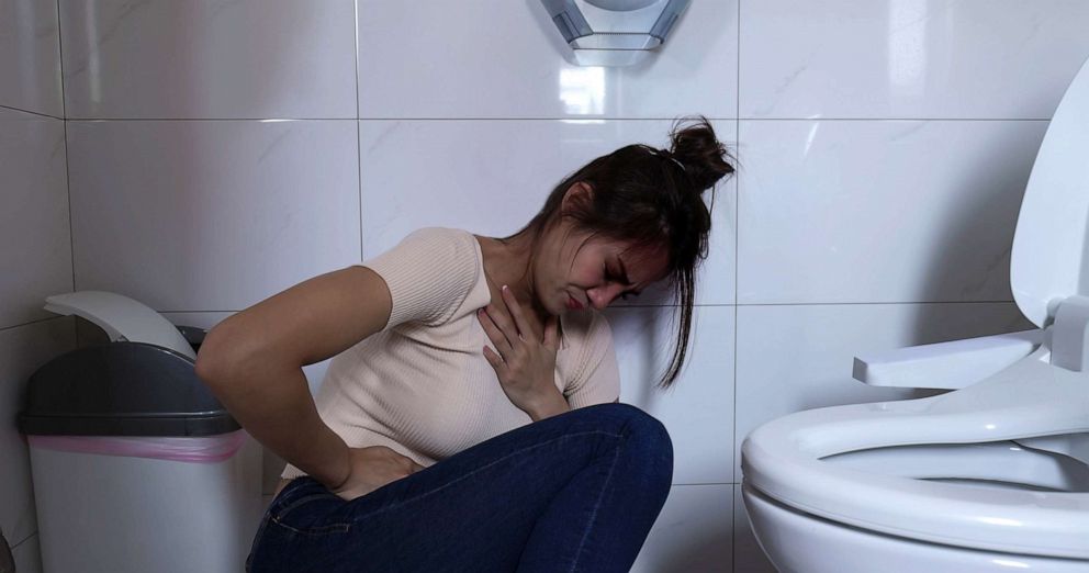 PHOTO: Woman feeling sick.