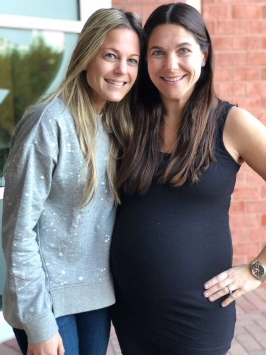PHOTO: Erin Silverman, right, poses with her sister, Randi Fishman, during her pregnancy.