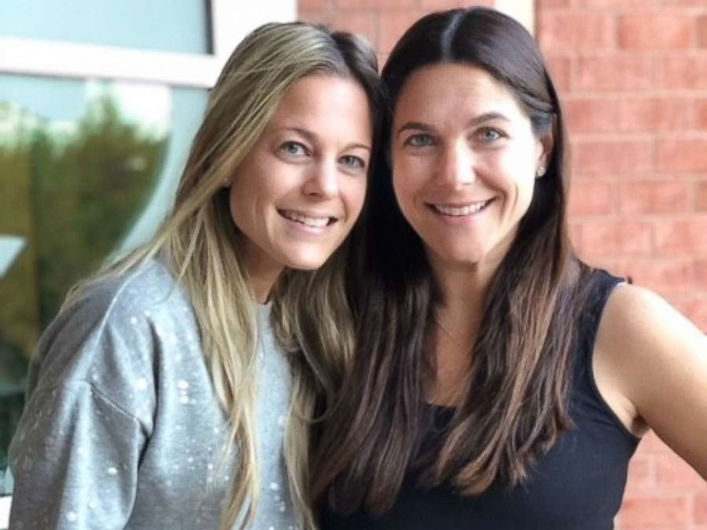 PHOTO: Erin Silverman, right, poses with her sister, Randi Fishman, during her pregnancy.