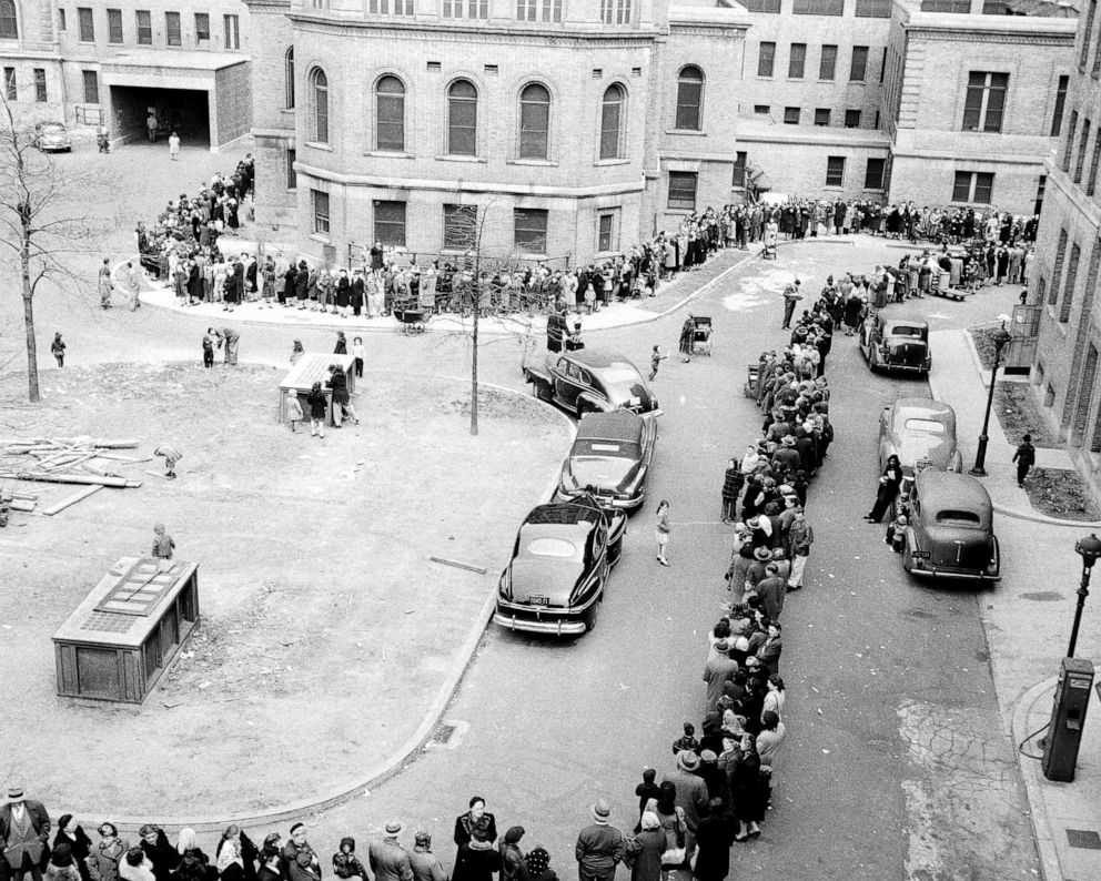 PHOTO: A long line winds up to and around Morrisania Hospital at 167th Street and Gerard Avenue in the Bronx, New York, as thousands await turn to be innoculated against smallpox, April 14, 1947.