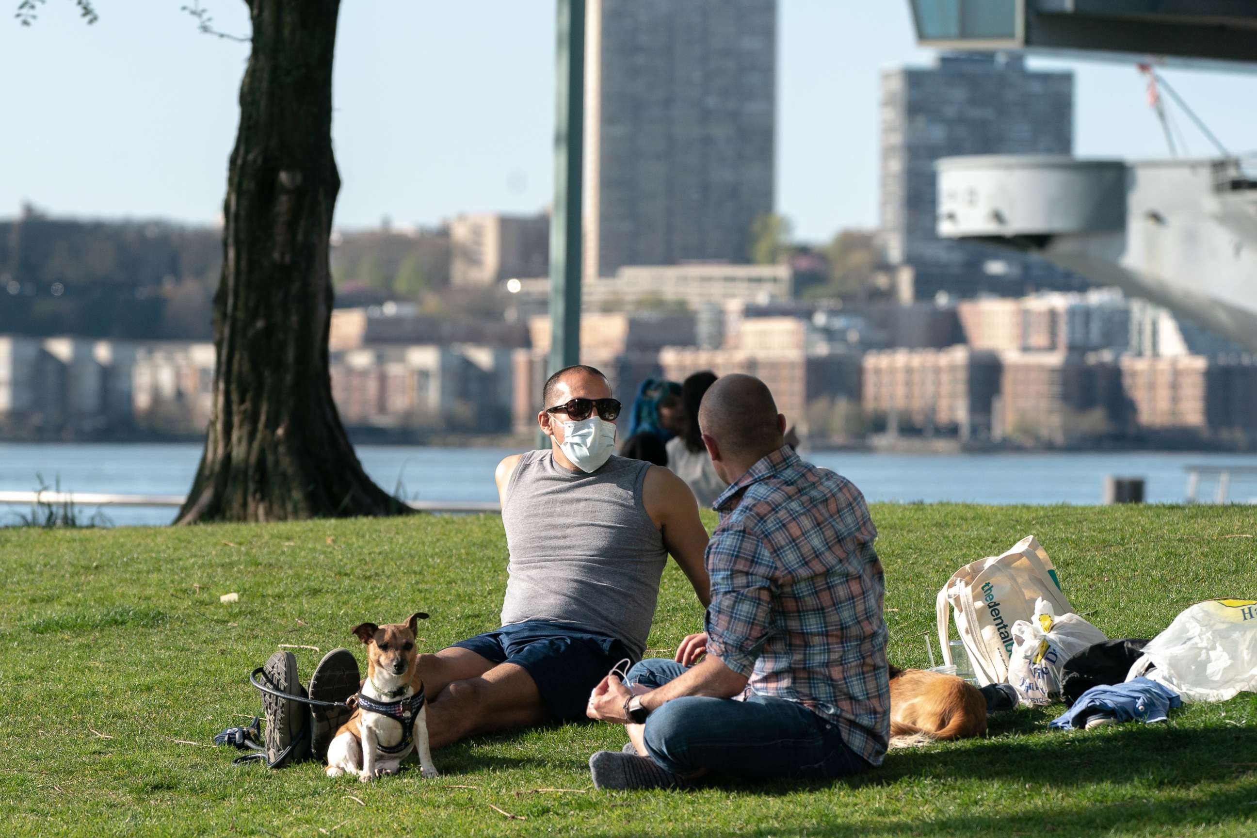 PHOTO: A man wearing a protective mask enjoys the weather near Hudson River Park, April 28, 2020, in New York City.
