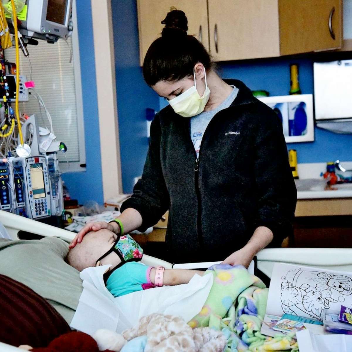 PHOTO: Shelby Skiles comforts her 2-year-old daughter Sophie as she undergoes treatment for T-cell lymphoma.