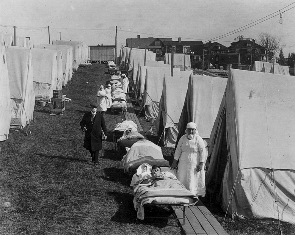 PHOTO: In this October, 1918, file photo, tents and patients are shown at an emergency hospital to care for influenza cases, Brookline, Mass.