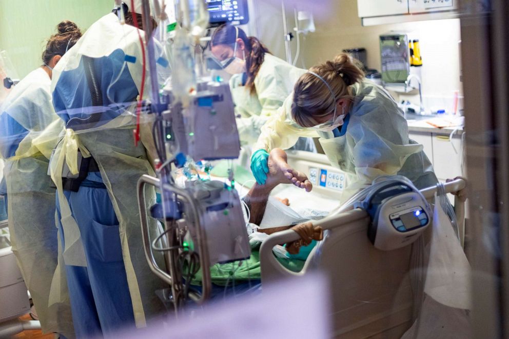 PHOTO: Medical professionals pronate a 39-year old unvaccinated COVID-19 patient in the Medical Intensive care unit (MICU) at St. Luke's Boise Medical Center in Boise, Idaho, Aug. 31, 2021.
