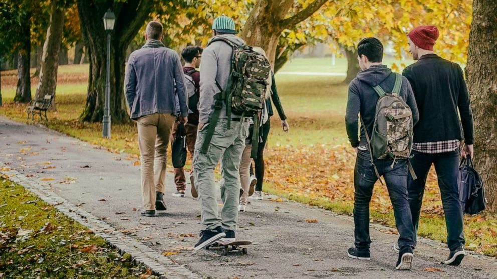 PHOTO: In this undated file photo, students walk through a park in autumn.