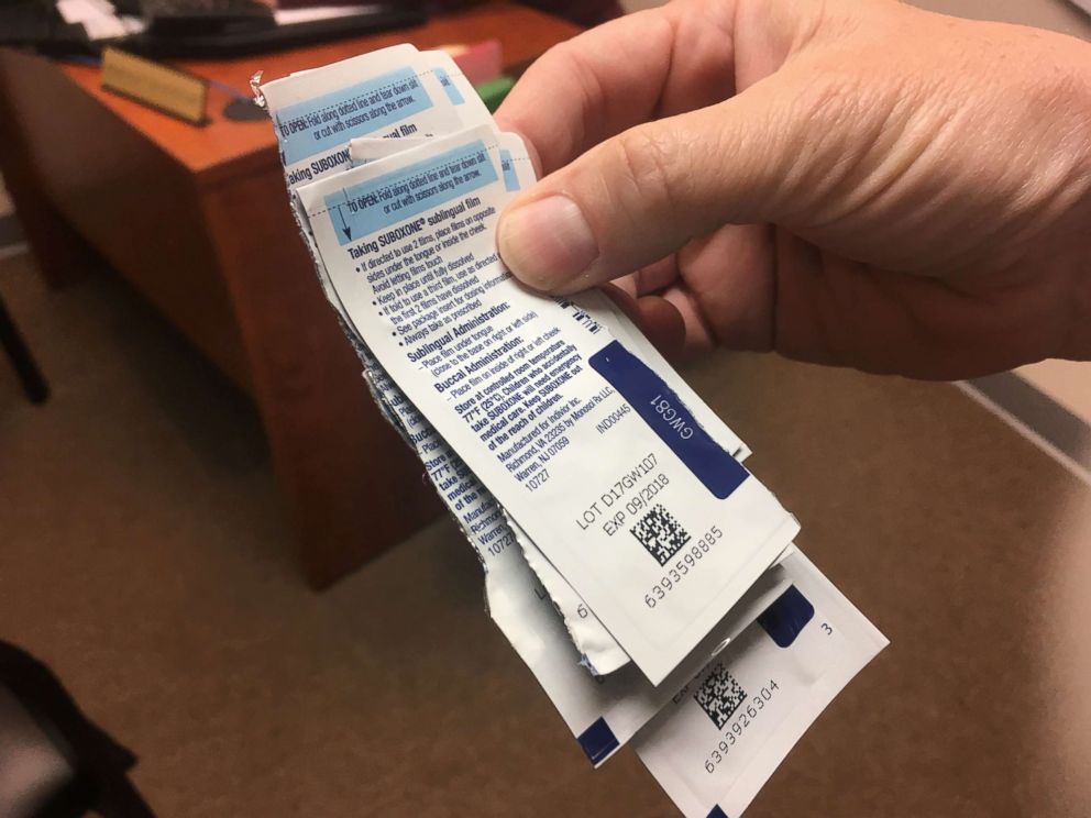 PHOTO: Staff at CleanSlate, an addiction treatment center in Anderson, Ind., count patients' Suboxone wrappers to make sure they adhere to their buprenorphine regimen.