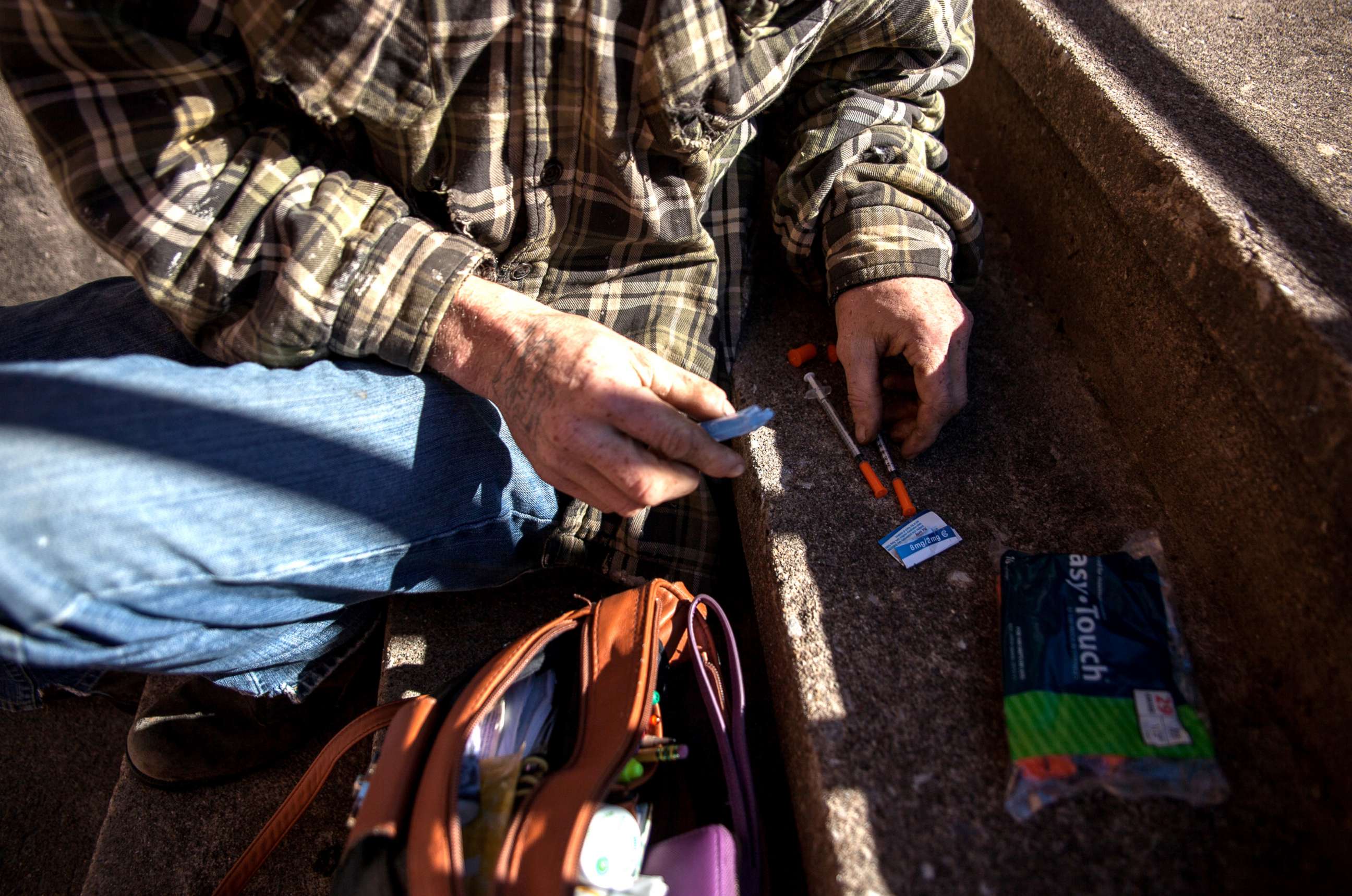 PHOTO: Daryl, who has had an opioid use disorder for more than a decade, prepares to inject Suboxone he bought on the street. He said it helped him remember what being normal felt like.