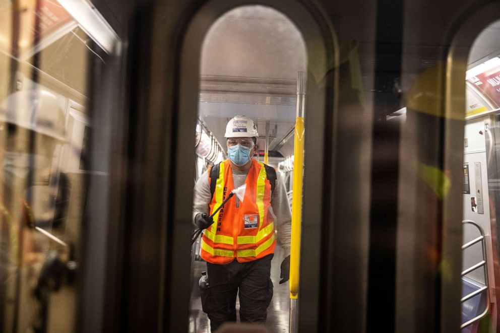 PHOTO: A New York City MTA transit worker cleans a subway car, during the outbreak of coronavirus in New York, May 5, 2020. 