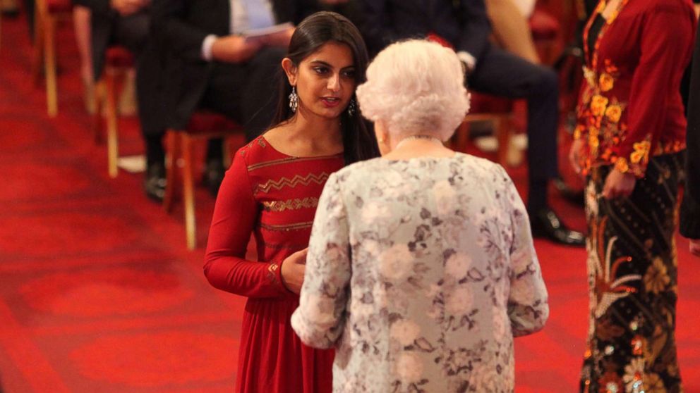 PHOTO: Suhani Jalota from India receives a Queen's Young Leaders Award for 2017 from Queen Elizabeth II at the 2017 Queen's Young Leaders Awards Ceremony at Buckingham Palace on June 29, 2017 in London.