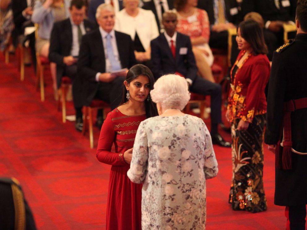 PHOTO: Suhani Jalota from India receives a Queens Young Leaders Award for 2017 from Queen Elizabeth II at the 2017 Queens Young Leaders Awards Ceremony at Buckingham Palace on June 29, 2017 in London.