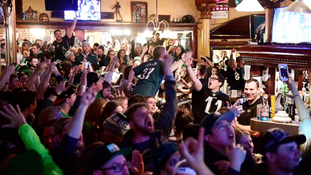 PHOTO: In this Feb. 4, 2018, file photo, Eagles fans react to a Super Bowl LII win while watching TV at The Irish Pub in downtown Philadelphia.