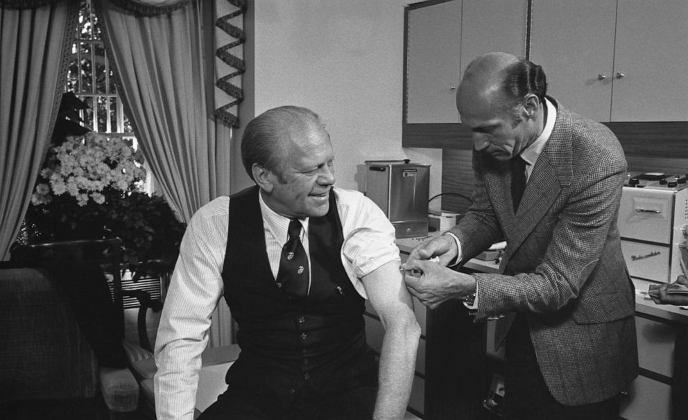PHOTO: President Gerald Ford is injected with a swine flu inoculation by White House physician, Dr. William Lukash, in Washington D.C., Oct. 14, 1976.