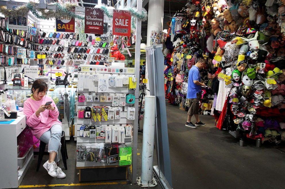 PHOTO: Shop keepers await customers in the Chinatown district, March 4, 2020 in Sydney, Australia as business declines during the ongoing coronavirus outbreak.