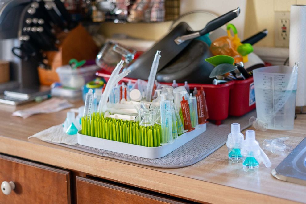 PHOTO: A tray of syringes sits on the kitchen countertop. Anderson Moreno needs about two dozen different medicines every 24 hours, his mother says.