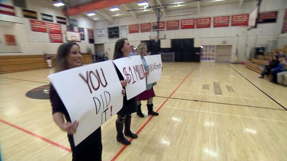 PHOTO: The teachers at Ipswich Middle School share the good news with their sixth-grade students: Their viral video helped raise $1 million for classmate Talia Duff's foundation.