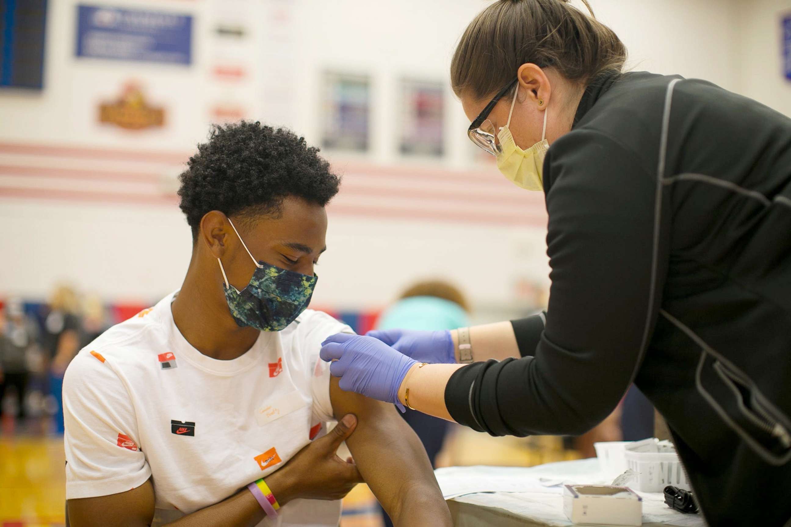 PHOTO: Camden Beatty, 17, receives his first COVID vaccine at Thomas Worthington High School Wednesday, April 7, 2021, through Nationwide Children's Hospital's vaccine clinics for teenagers in Columbus, Ohio, April 7, 2021.