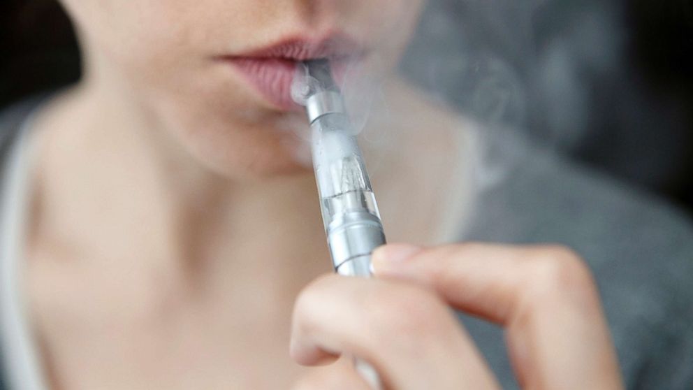 PHOTO: In this undated stock photo, a teen is smoking an e-cigarette.