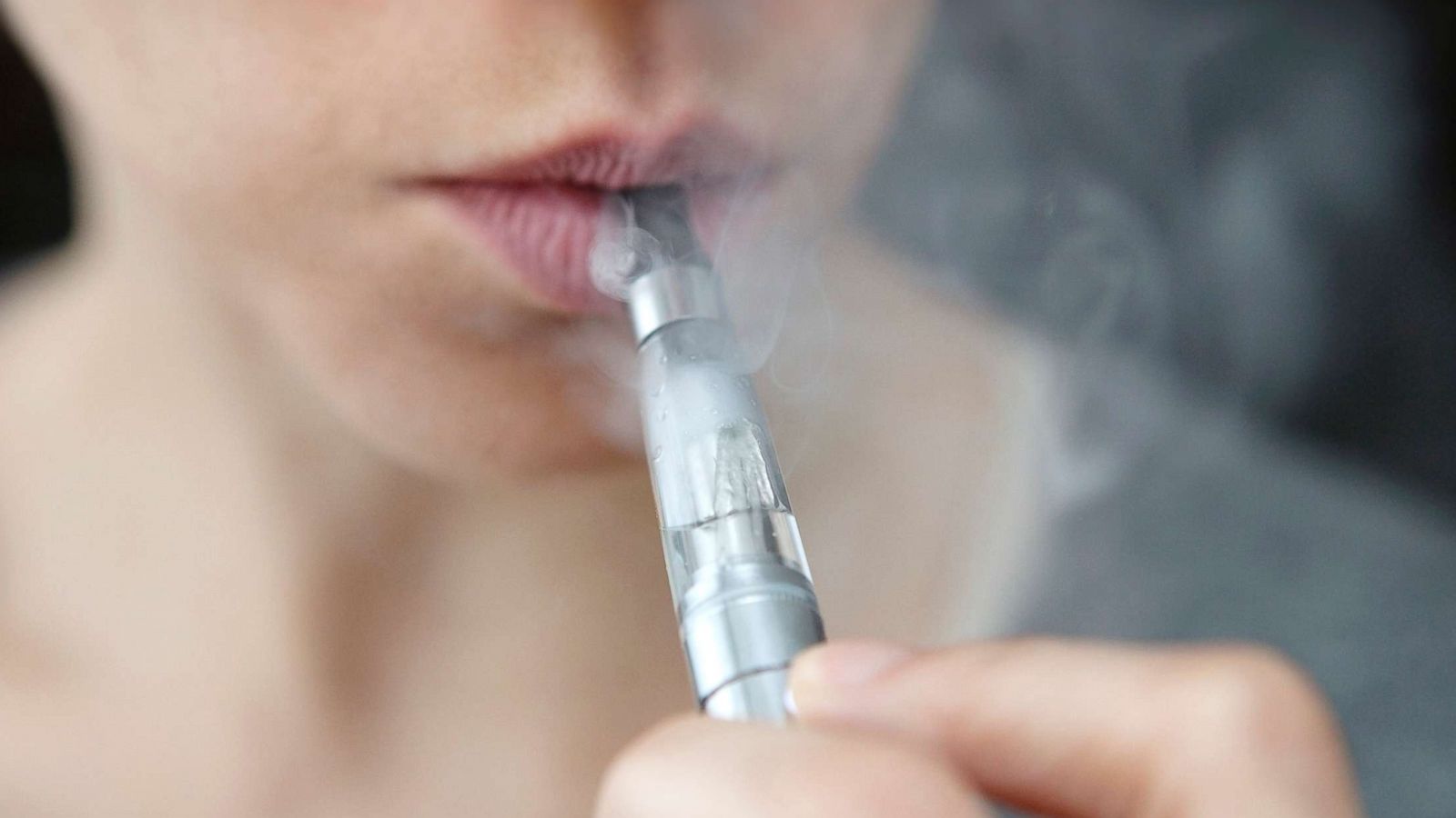 PHOTO: In this undated stock photo, a teen is smoking an e-cigarette.