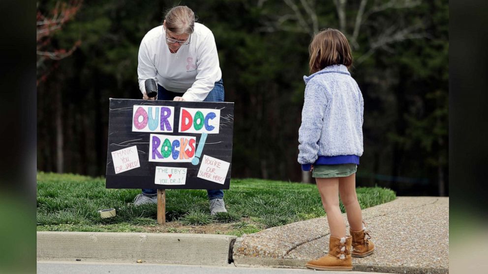 Neighbors thank organizer with surprise parade after COVID-19