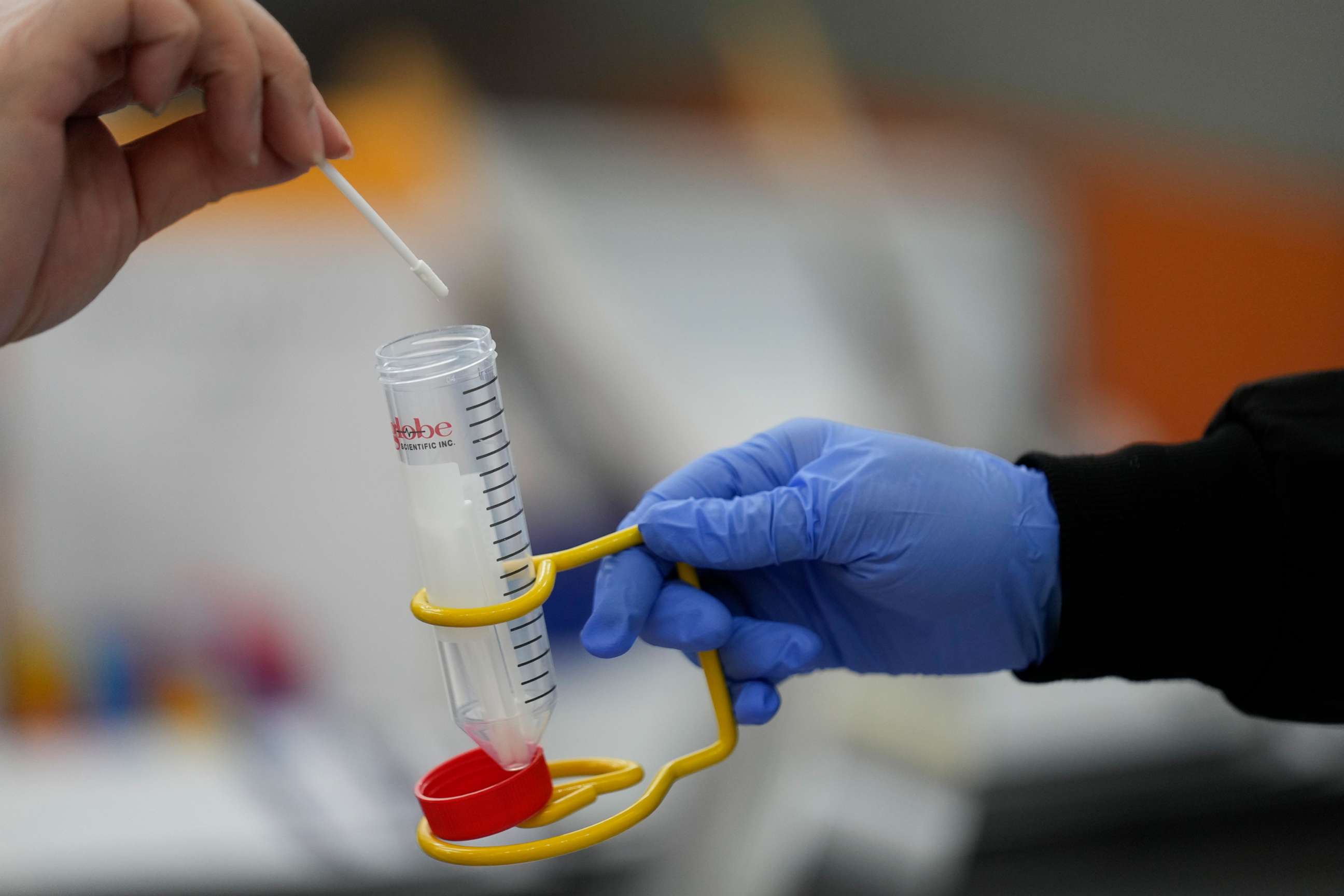 PHOTO: Passengers disembarking from international flights take anonymous COVID tests for study purposes at Newark Liberty International Airport in Newark, N.J., Jan. 4, 2023.