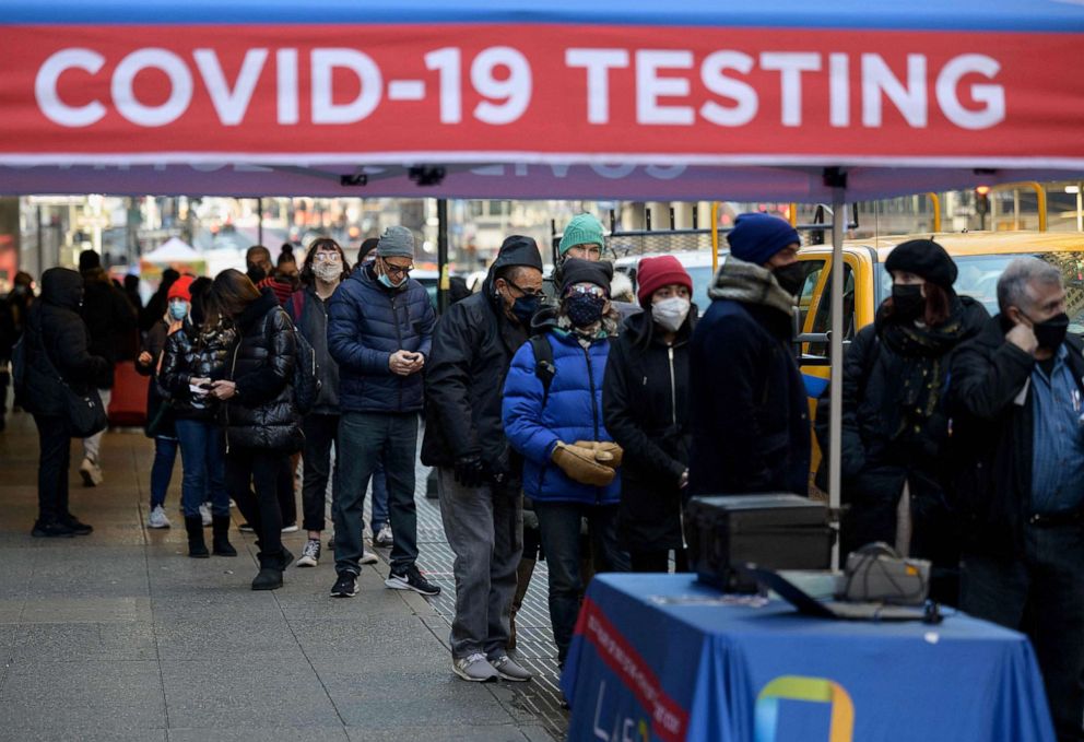PHOTO: People wait in line to receive a COVID-19 test, Jan. 4, 2022, in New York.