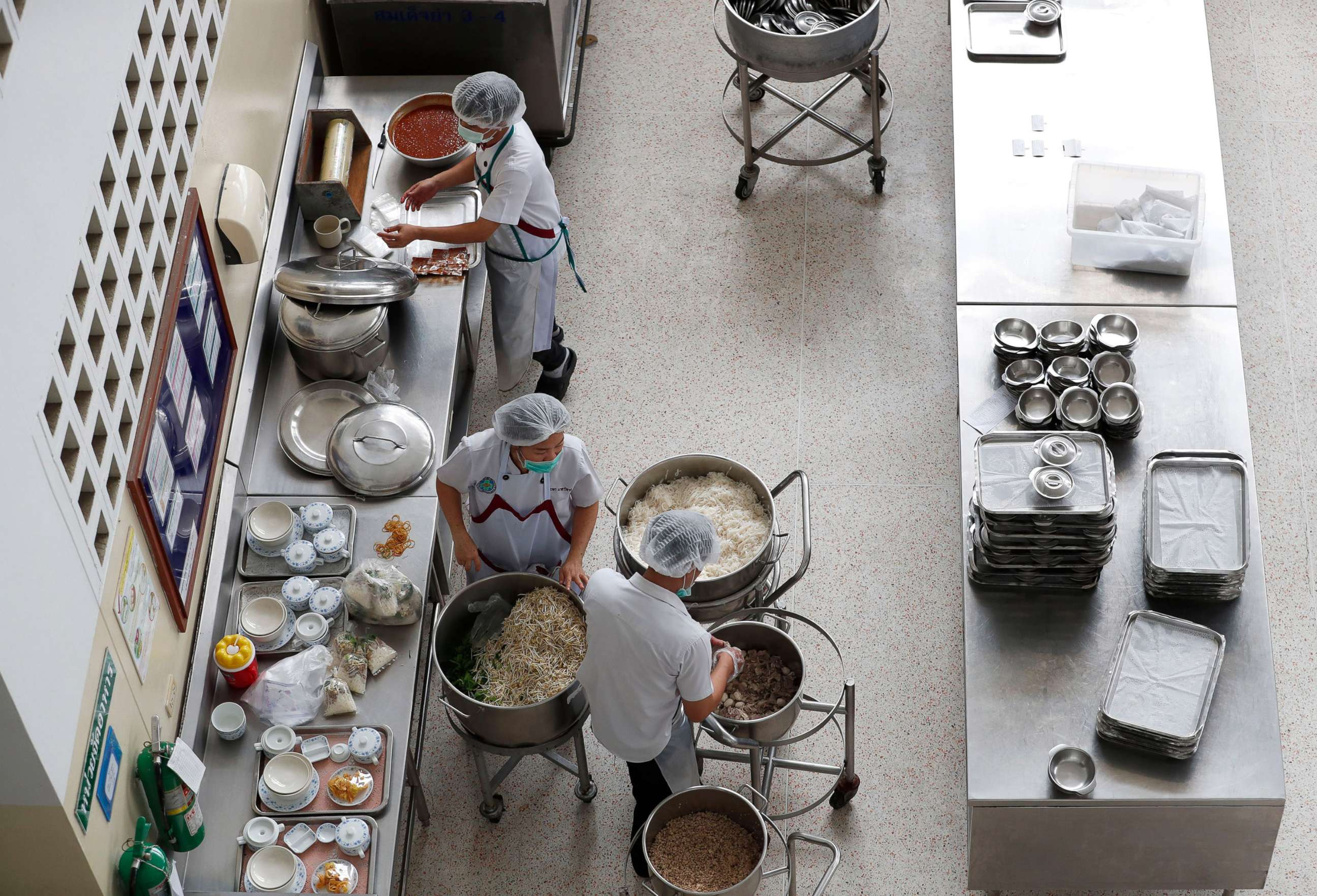 PHOTO: Thai nutritionists prepare foods at Chiangrai Prachanukroh Hospital, where eight boys of a soccer team are staying after they were rescued from Tham Luang cave in Chiang Rai province, Thailand, July 10, 2018.