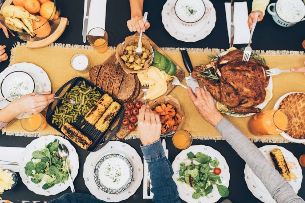 PHOTO: A group shares a holiday meal in an undated stock image.