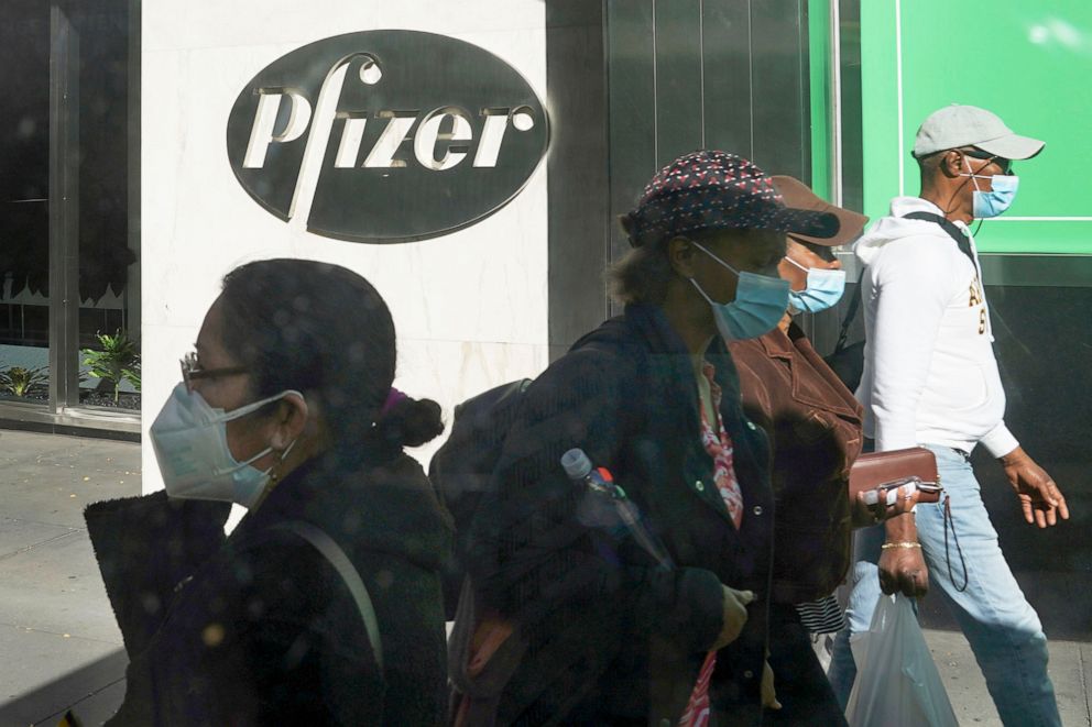 PHOTO: Pedestrians walk past Pfizer world headquarters in New York, Nov. 9, 2020.